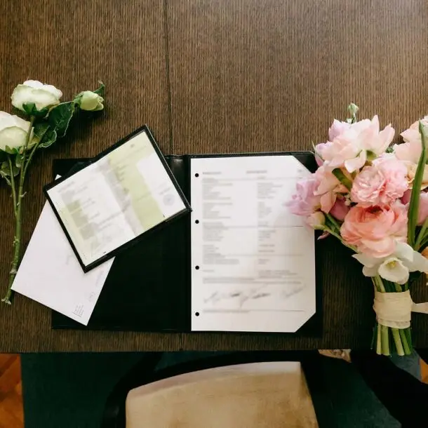 Dutch marriage certificate and official wedding documents displayed on a table after legal registration