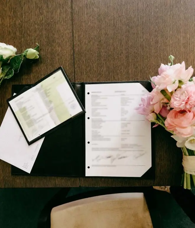 Dutch marriage certificate and official wedding documents displayed on a table after legal registration