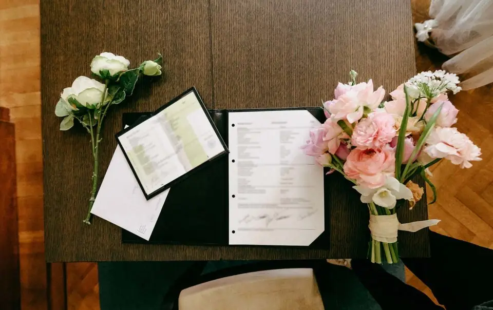 Dutch marriage certificate and official wedding documents displayed on a table after legal registration