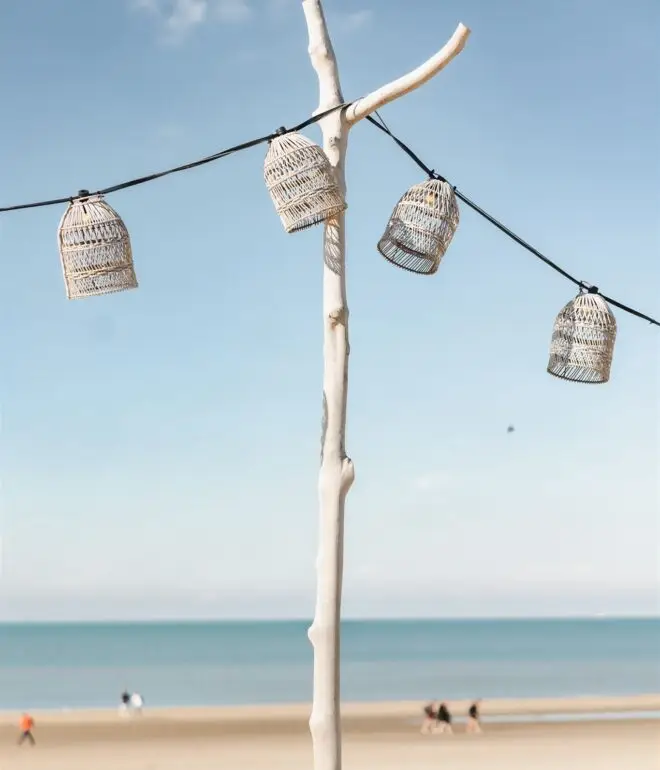Minimal beach ceremony decor setup on the Dutch coast during a beach elopement near Amsterdam