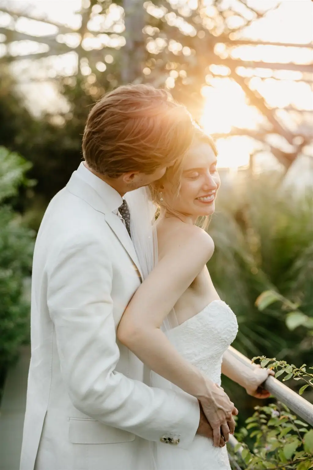 Couple embracing during golden hour after an intimate Amsterdam elopement ceremony