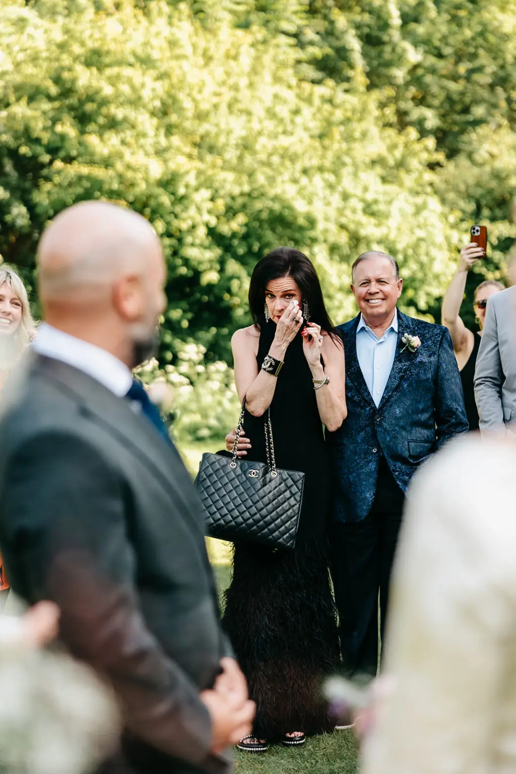 Emotional guest reacting during an outdoor elopement ceremony in a park in Amsterdam