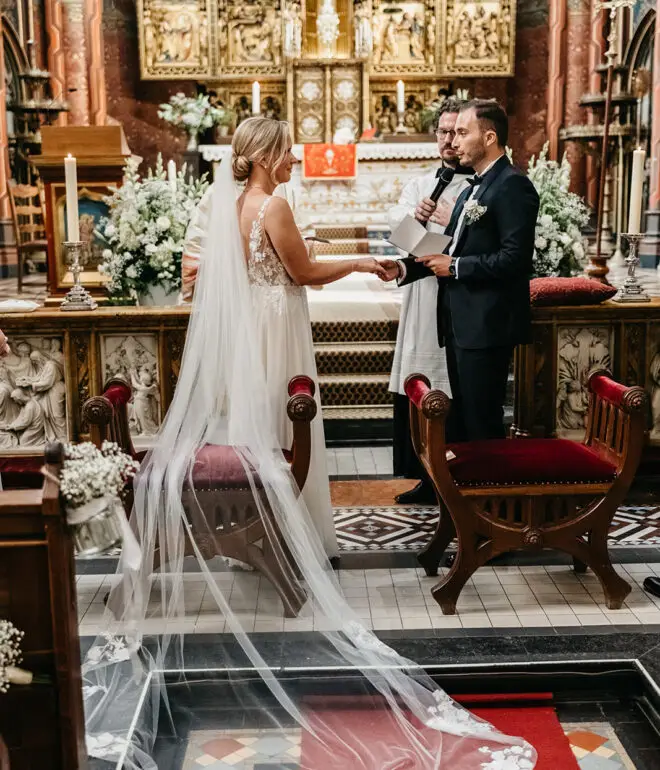 Couple exchanging vows inside a church during an intimate ceremony in Amsterdam