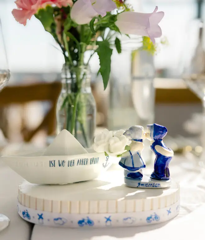 Personalized wedding details and floral table styling during an Amsterdam elopement celebration