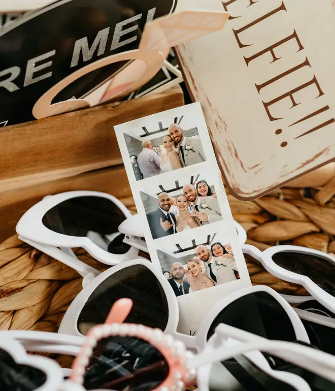 Wedding photo booth prints and personalized guest details during an Amsterdam elopement celebration