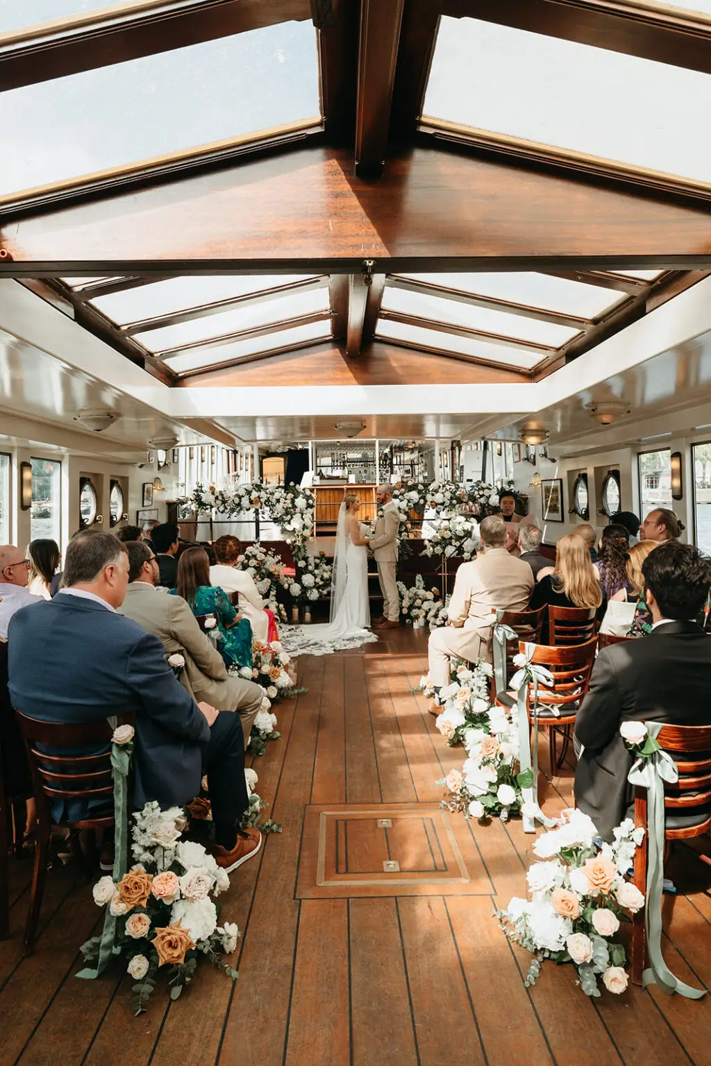 Wedding ceremony aboard Het Wapen van Amsterdam canal boat in Amsterdam