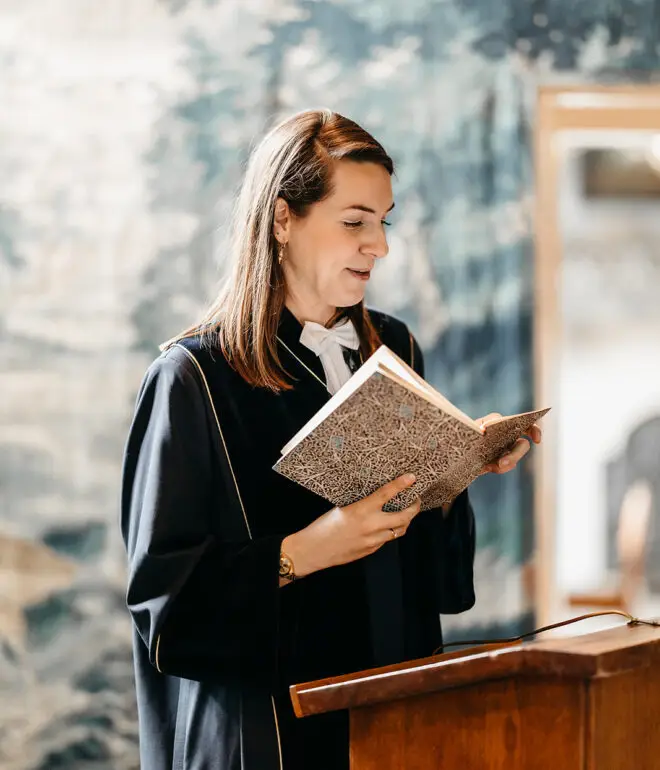 Wedding officiant speaking during a civil marriage ceremony in Amsterdam