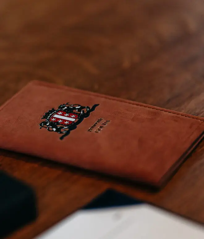 Official Amsterdam marriage booklet on a table during a Dutch civil wedding ceremony