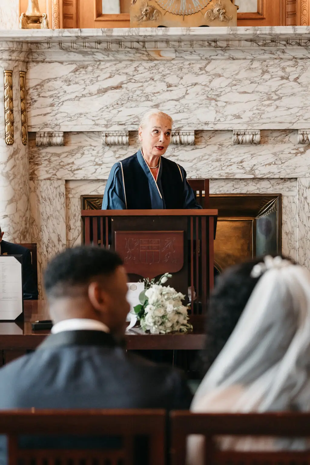 Wedding officiant speaking during a legal marriage ceremony in the Netherlands