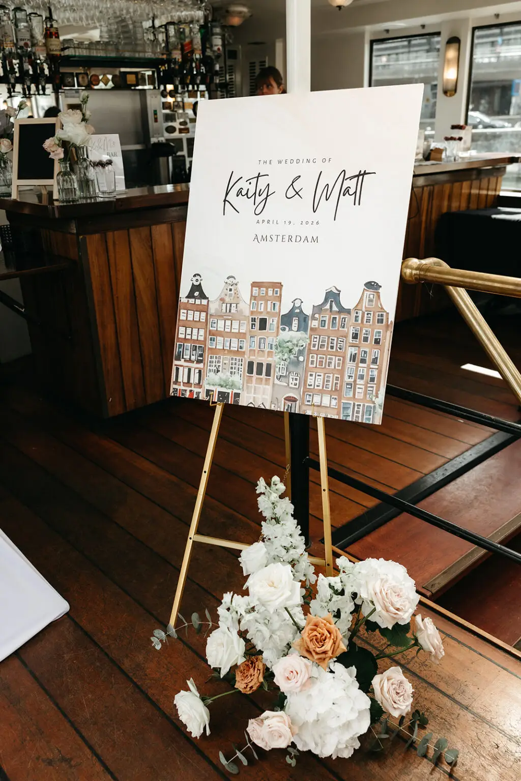 Personalised wedding welcome sign with Amsterdam canal houses displayed inside Het Wapen van Amsterdam