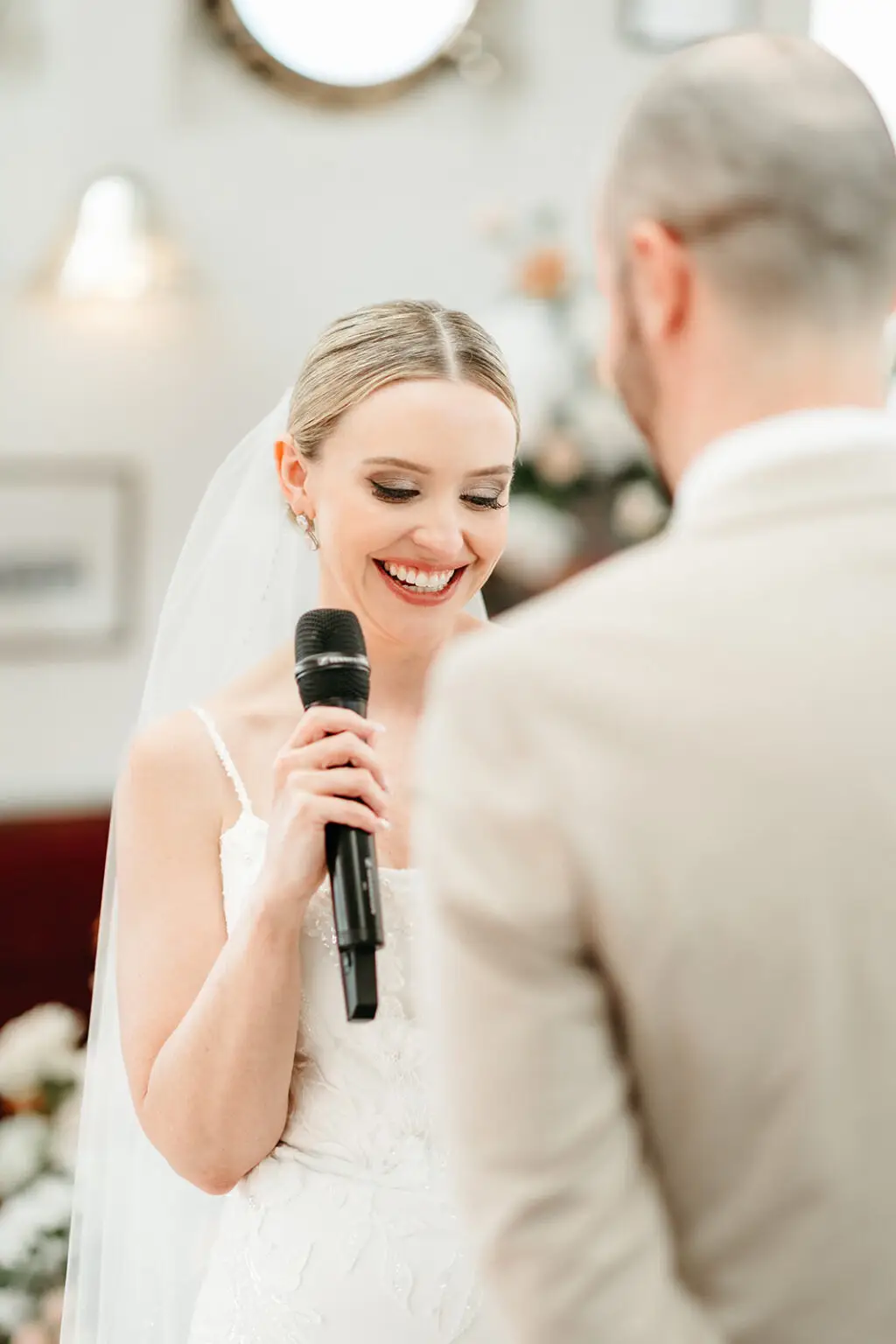 Bride reading personal vows during a symbolic ceremony aboard Het Wapen van Amsterdam